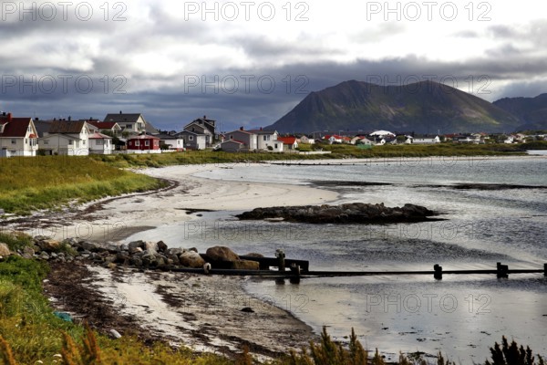Idyllic seaside village landscape with mountains in the background in Andenes, Vesterålen, Norway