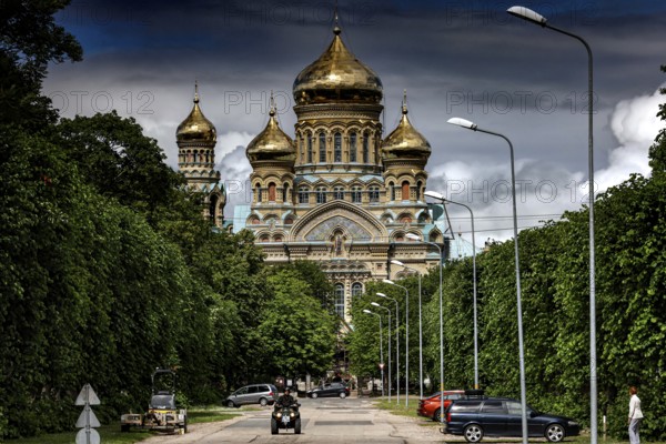Impressive church with golden domes in Karosta, surrounded by green trees, Liepaja, Courland,