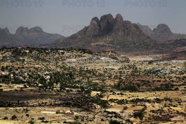 Wide landscape surrounded by the impressive Adua mountain range, Adua, Tigray, Ethiopia