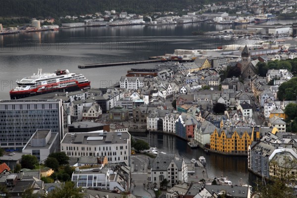 Panoramic view of Ålesund's old town with a Hurtigruten ship in the harbor, Ålesund, Norway