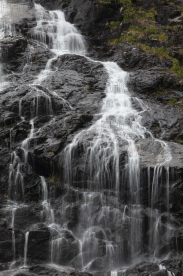 Summer day visiting Espelandsfossen falls near Bergen, scenic nature and flowing water, Vestland,