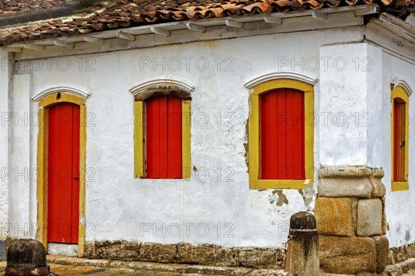 House facade with colorful doors and windows in the historic city of Paraty, Paraty, Rio de
