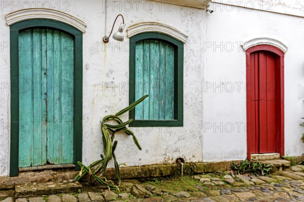Old house facade with colorful doors and windows in the historic city of Paraty, Paraty, Rio de