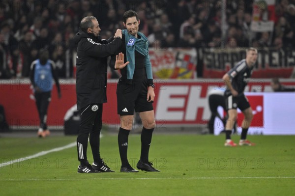 Fourth Official Referee Referee Referee Patrick Alt addresses microphone from referee Referee Dr.