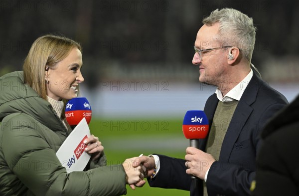 SKY presenter reporter Nele Ocik formerly Schenker interviewed microphone micro logo with CEO