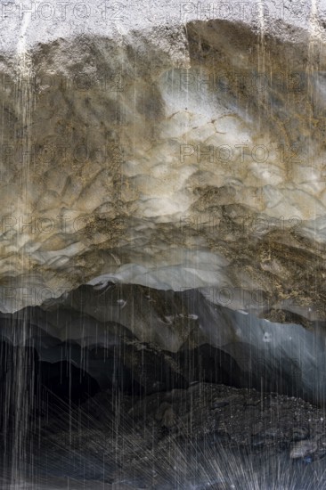 Meltwater at a glacier cave, underground glacier stream, Castner Glacier, Delta Range, Alaska