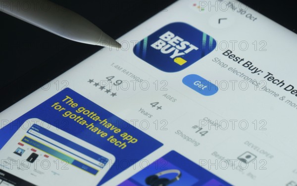 Dhaka, Bangladesh- 30 Oct 2025: Best Buy app on a iPad screen with a pen pointing at the install