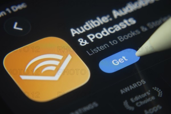 Dhaka, Bangladesh- 01 Dec 2025: A close-up of the Audible app icon in the App Store on an iPad