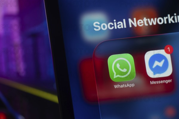 Dhaka, Bangladesh- 01 Dec 2025: WhatsApp and Messenger app on iPad