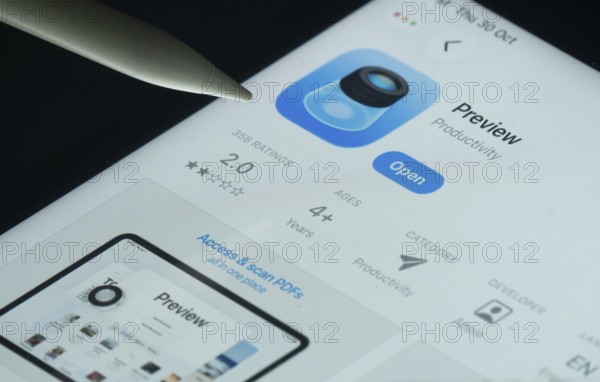 Dhaka, Bangladesh- 30 Oct 2025: Apple Preview app on a iPad screen with a pen pointing at the