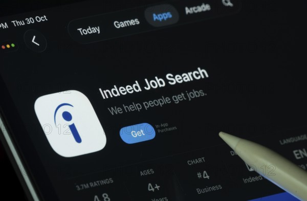 Dhaka, Bangladesh- 30 Oct 2025: Indeed app displayed on a iPad screen in dark mode with a digital
