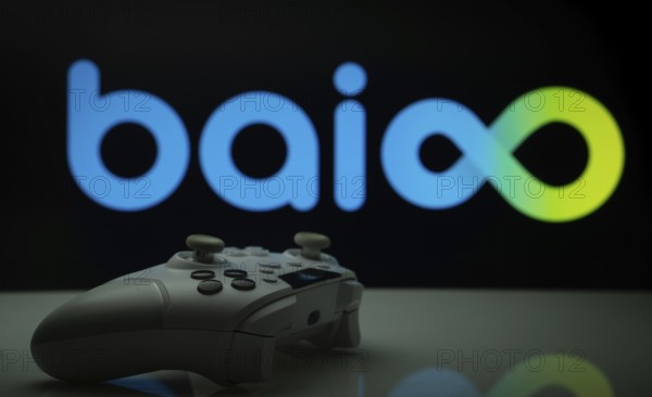 Dhaka, Bangladesh- 20 Mar 2025: A close-up of a white gamepad with the Baioo Family Interactive Ltd