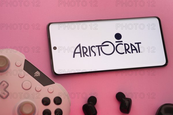 Dhaka, Bangladesh- 08 Apr 2025: A smartphone displaying the Aristocrat logo next to a gaming