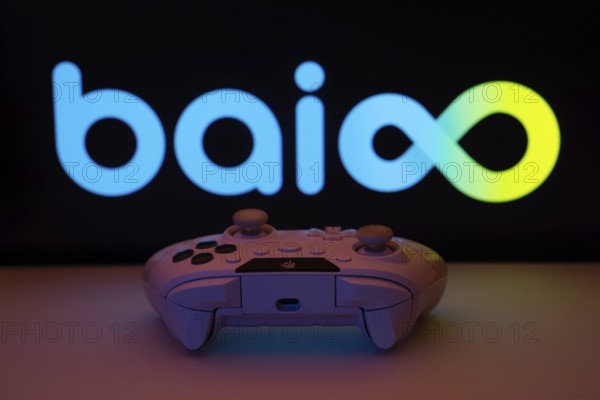 Dhaka, Bangladesh- 08 Apr 2025: A gaming controller in front of a Baioo Family Interactive Ltd
