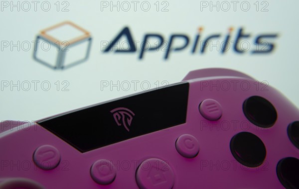 Dhaka, Bangladesh- 24 Mar 2025: A close-up of a gamepad with the Appirits seen on screen in the