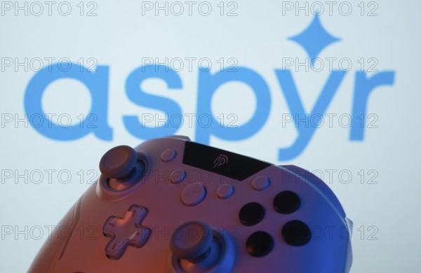 Dhaka, Bangladesh- 20 Mar 2025: A close-up of a gamepad with the Aspyr seen on screen in the