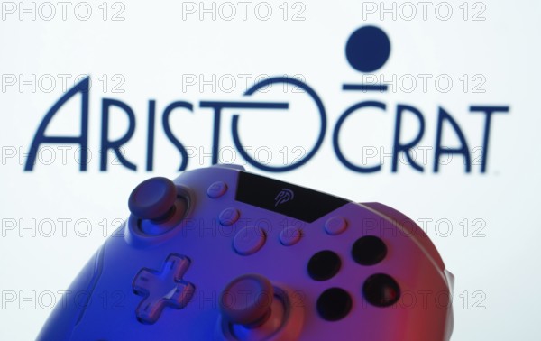 Dhaka, Bangladesh- 20 Mar 2025: A close-up of a gamepad with the Aristocrat seen on screen in the