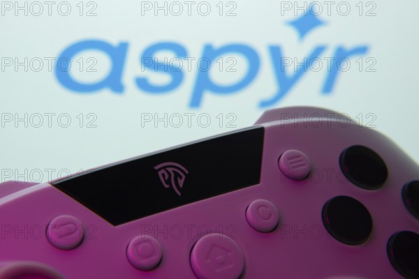 Dhaka, Bangladesh- 24 Mar 2025: A close-up of a gamepad with the Aspyr seen on screen in the