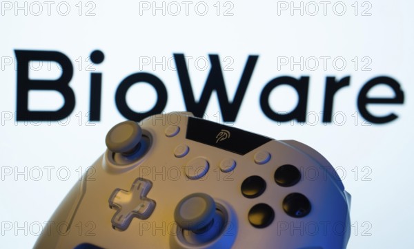 Dhaka, Bangladesh- 20 Mar 2025: A close-up of a gamepad with the BioWare seen on screen in the