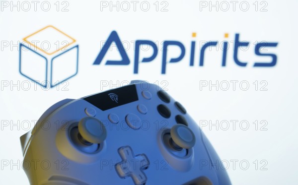 Dhaka, Bangladesh- 20 Mar 2025: A close-up of a gamepad with the Appirits seen on screen in the