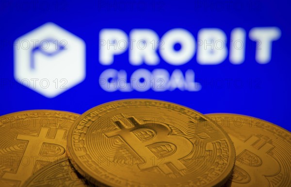 Dhaka, Bangladesh- 27 Mar 2025: Close-up of Bitcoin coins with the ProBit Global logo visible on a