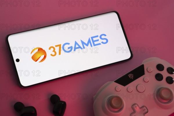 Dhaka, Bangladesh- 08 Apr 2025: A smartphone displaying the 37Games logo next to a gaming