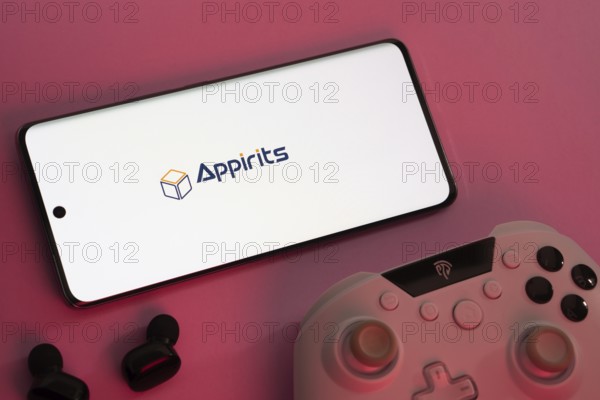 Dhaka, Bangladesh- 08 Apr 2025: A smartphone displaying the Appirits logo next to a gaming