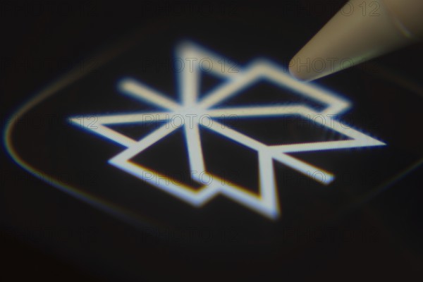 Dhaka, Bangladesh- 06 Dec 2025: Close-up of the Perplexity app on a screen with a stylus pointing