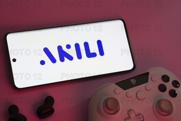 Dhaka, Bangladesh- 08 Apr 2025: A smartphone displaying the Akili Interactive logo next to a gaming