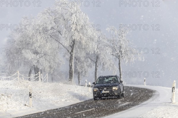 Winter in the Swabian Jura. Country road with snowy landscape near Westerheim, Alb-Donau-Kreis,
