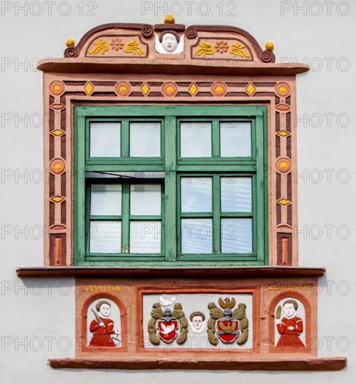 Detail, House facade, late Renaissance stone carving, Justitia and Clementia, justice and charity