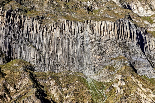 Detailed view of impressive geological formations on a rock wall, the landscape of the Colca Canyon