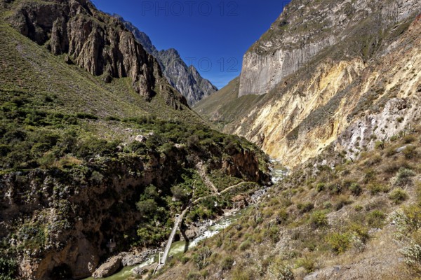 Impressive gorge landscape with winding river and surrounding steep mountain walls, The landscape