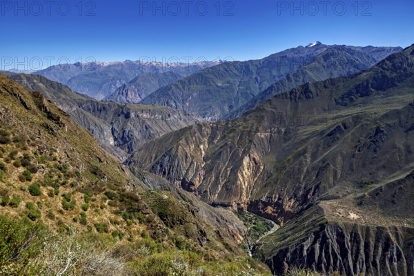 Impressive views of a deep gorge with steep mountain slopes and rocky formations, The landscape of