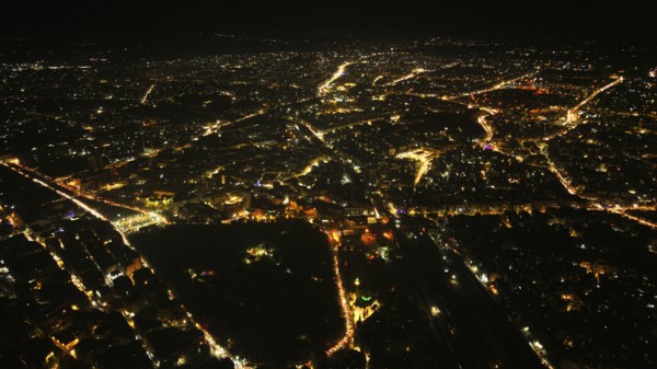 A Drone night view of Aleppo, Syria on December 19, 2025, showing illuminated streets, dense
