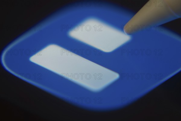 Dhaka, Bangladesh- 06 Dec 2025: Close-up of the Trello app on a screen with a stylus pointing at it