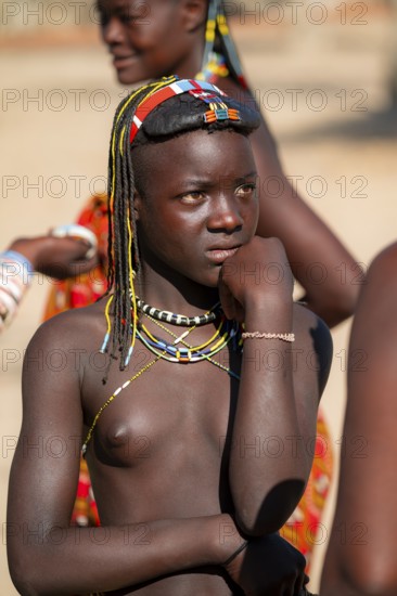 Portrait, brightly decorated girl of the Hakaona tribe, also Havakona or Hakawona, near Opuwo,