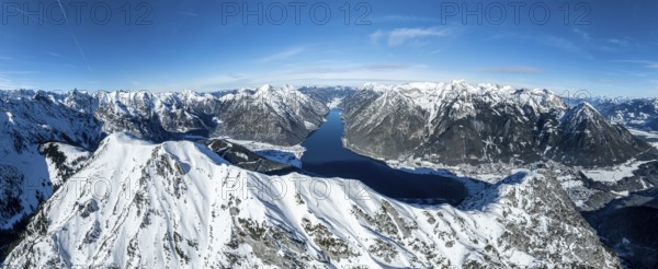 Aerial view, epic view of mountain landscape with snow in winter, summit of Bärenkopf, Achensee,