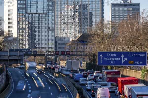 The A40 motorway, Ruhrschnellweg, in Essen, city skyline, Evonik office building, traffic jam in