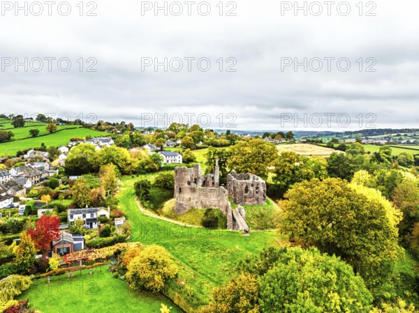 Autumn Colours over ruins of Grosmont Castle from a drone, Grosmont, Monmouthshire, Wales, UK