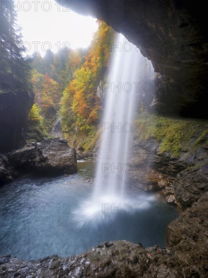 Waterfall mountain list in autumn-colored surroundings, Linthal, Klausenpass, Canton of Glarus,
