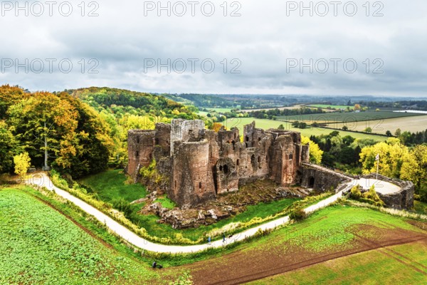 Autumn Colours over ruins of Goodrich Castle and River Wye from a drone, Goodrich, Herefordshire,