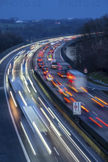 Evening traffic on the A52 motorway, between Düsseldorf and Essen, at the Ruhr Valley Bridge,