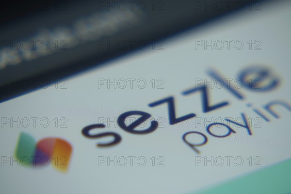 Dhaka, Bangladesh- 02 Dec 2025: A Close-up of a laptop screen is displaying the Sezzle web