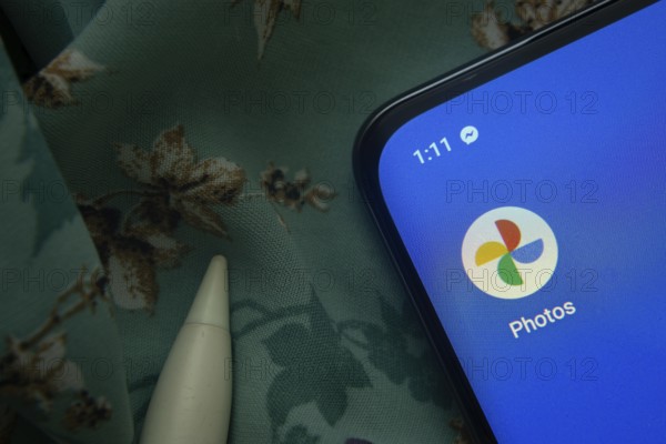 Dhaka, Bangladesh- 07 May 2025: Google Photos app icon is seen on smartphone