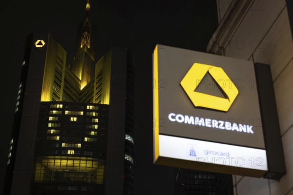 A yellow heart glows on the façade of the Commerzbank Tower in Frankfurt am Main at Christmas time