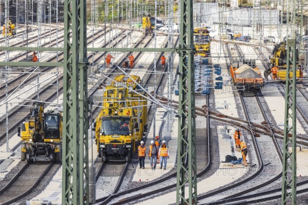 Rail construction crews with a work train. New parking station in Untertürkheim. As part of