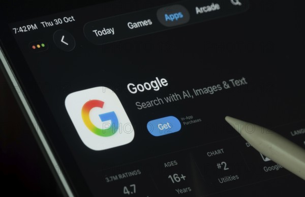 Dhaka, Bangladesh- 30 Oct 2025: Google app displayed on a iPad screen in dark mode with a digital