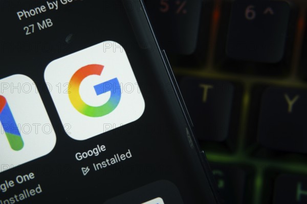 Dhaka, Bangladesh- 27 July 2025: Close-up of smartphone screen showing the Google app icon with a