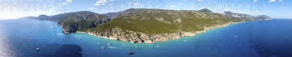 Panorama, picturesque rocky coast, cliffs and Cala Luna beach, aerial view, Golfo di Orosei,